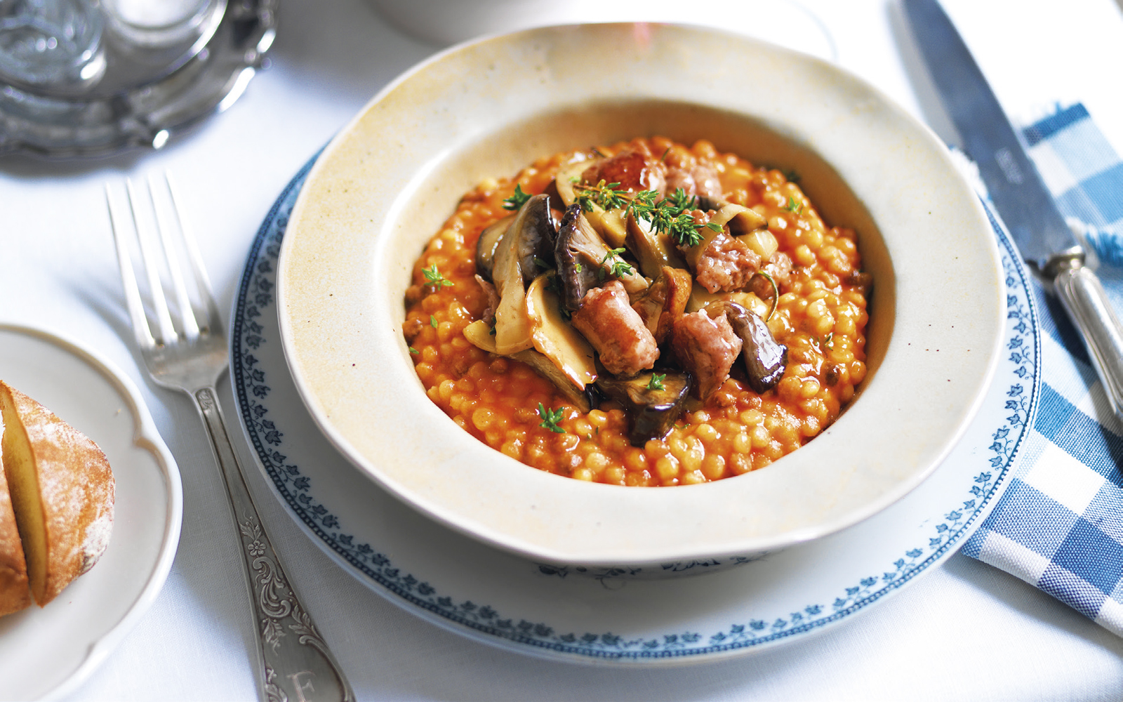 Ricetta Fregola, salsiccia e funghi